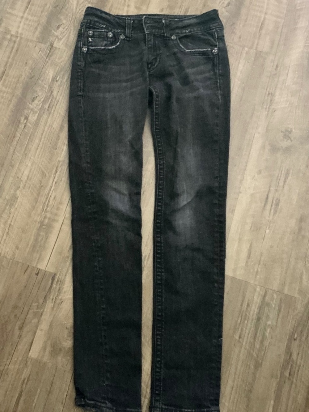 Miss Me Angel Wings Skinny Jeans in a faded black wash, size 29